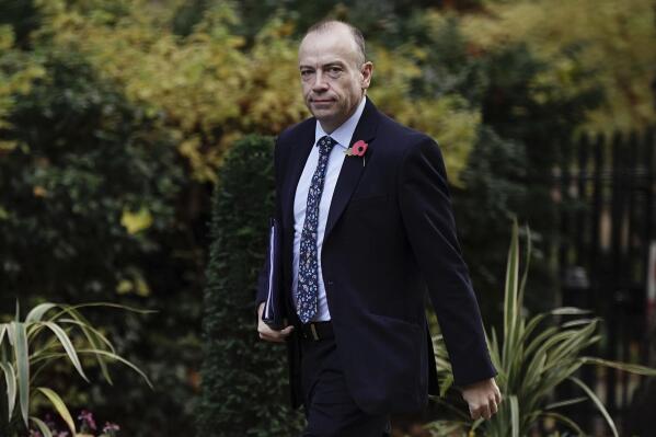 Northern Ireland Secretary Chris Heaton-Harris arrives in Downing Street to attend a cabinet meeting in London, Tuesday, Nov. 8, 2022. (Aaron Chown/PA via AP)