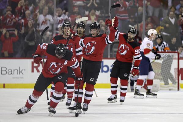 New Jersey Devils defenseman P.K. Subban (76) reacts in front of teammates after scoring a goal against the Florida Panthers during the second period of an NHL hockey game Tuesday, Nov. 9, 2021, in Newark, N.J. (AP Photo/Adam Hunger)