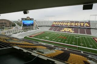 FILE - TCF Bank Stadium is shown during a media tour in Minneapolis, in this Tuesday, June 16, 2009, file photo. The home for Minnesota's football games has a new name: Huntington Bank Stadium. The university's board of regents approved the change at a meeting on Tuesday, June 29, 2021, by a 9-2 vote. (AP Photo/Jim Mone, File)