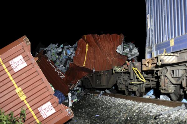 This shows the site of a train collision near Novska, Croatia, Saturday, Sept. 10, 2022. A passenger train and freight train collided Friday night in central Croatia, causing some deaths and injuries, authorities said. (AP Photo)