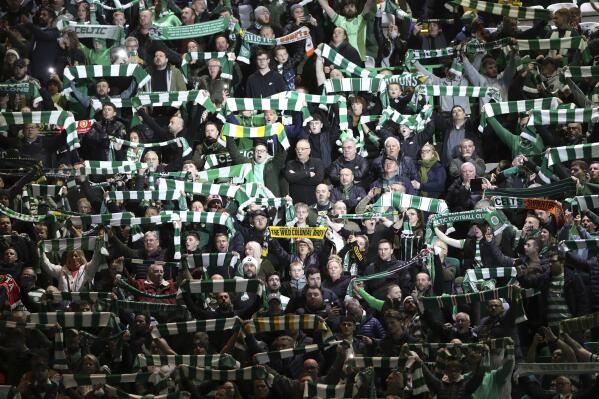Celtic's fans support their team before the start of the Champions League Group F soccer match between Celtic and Shakhtar Donetsk at Celtic park, Glasgow, Scotland, Tuesday, Oct. 25, 2022. (AP Photo/Scott Heppell)