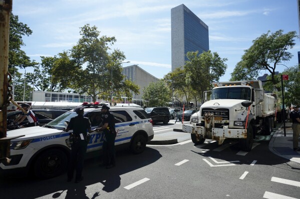 Police and sanitation vehicles block access to 1st Street ahead of the United Nations General Assembly in New York, Sunday, Sept. 17, 2023. (AP Photo / Bryan Woolston)