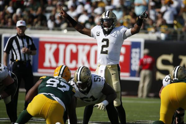 New Orleans Saints cornerback P.J. Williams (26) and quarterback Jameis  Winston (2) hug after an NFL