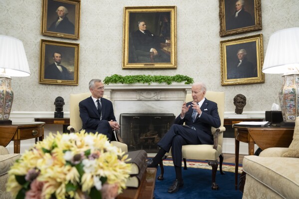 FILE - President Joe Biden meets with NATO Secretary General Jens Stoltenberg in the Oval Office of the White House, Tuesday, June 13, 2023, in Washington. President Joe Biden will head to Europe next week for a three-country swing in an effort to bolster the international coalition against Russian aggression as the war in Ukraine continues well into its second year. The main focus of the visit will be the annual NATO summit, which this year will be held in Vilnius, Lithuania. (AP Photo/Manuel Balce Ceneta, File)