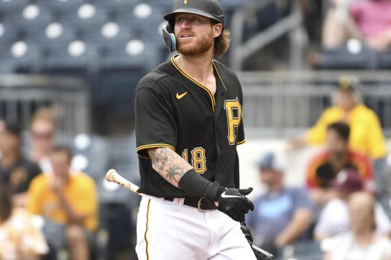 FILE - Pittsburgh Pirates' Ben Gamel (18) heads back to the dugout after striking out to Cincinnati Reds pitcher Buck Farmer during the seventh inning of a baseball game on Aug. 21, 2022, in Pittsburgh. Gamel has agreed to a minor league contract with the Tampa Bay Rays, according to a person with knowledge of the deal, Wednesday, Feb. 22, 2023. (AP Photo/Philip G. Pavely, File)