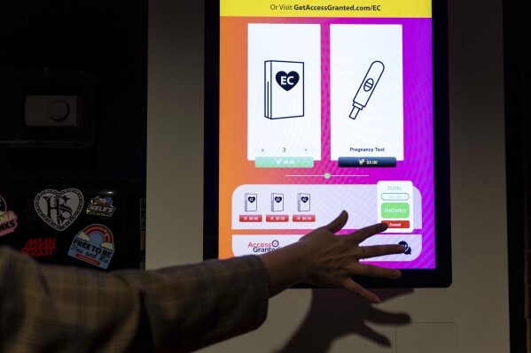 FILE - An emergency contraception vending machine is installed in a restroom at Nite Owl in Omaha, Neb., on April 25, 2024. Republican lawmakers in states across the U.S. have been rejecting Democrats' efforts to protect or expand access to birth control, an issue Democrats are promoting as a major issue in this year's elections along with abortion and other reproductive rights concerns. (Anna Reed/Omaha World-Herald via AP, File)