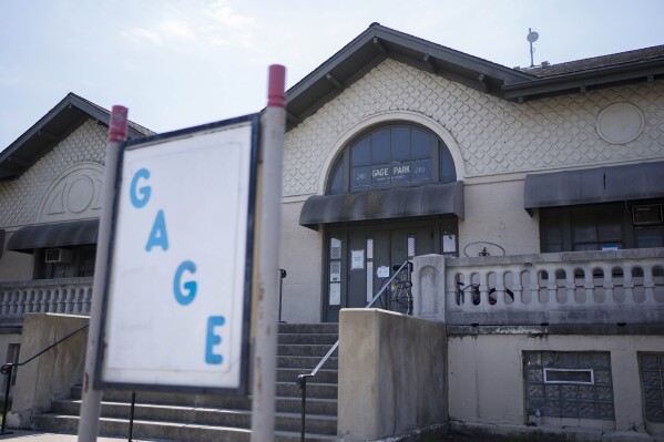 The Gage Park fieldhouse can be seen Thursday, March 28, 2024, in Chicago. Gage Park is one of the five shelters for migrants the city of Chicago plans to close in the coming weeks. The city's first step is moving 800 people into other shelters starting Saturday, clearing the park district fieldhouses to resume normal operations for summer. (AP Photo/Erin Hooley)