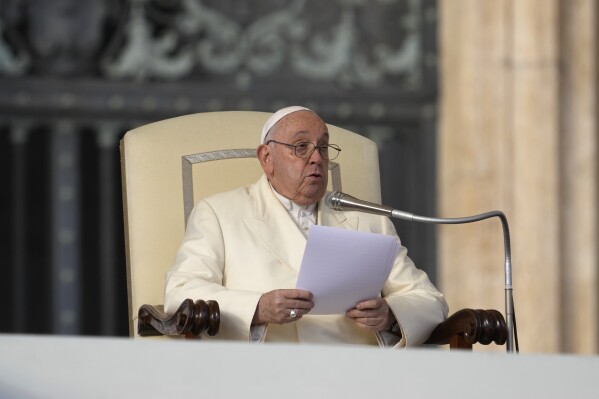 Pope Francis holds his weekly general audience in St. Peter's Square, at the Vatican, Wednesday, Nov. 22, 2023. (AP Photo/Andrew Medichini)