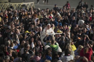 FILE - Pope Francis arrives in St. Peter's Square on the occasion of the weekly general audience at the Vatican, Wednesday, Nov. 6, 2024. (AP Photo/Alessandra Tarantino, File)