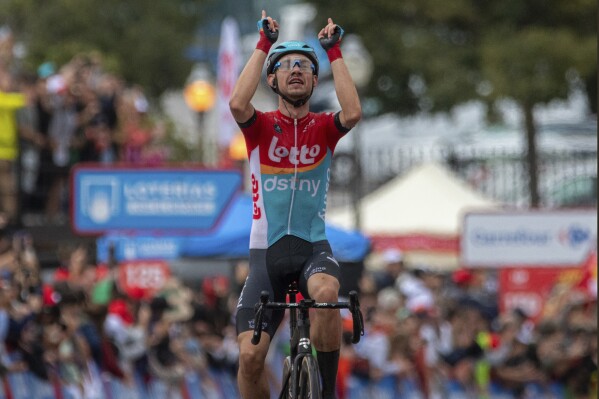 Andreas Kron of Denmark riding for the Lotto Dstny team, wins the 2nd stage of La Vuelta cycling race between Mataro and Barcelona, Spain, Sunday Aug. 27, 2023. (Lorena Sopena/Europa Press via AP)