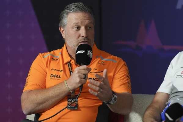 McLaren's Zak Brown gestures during a press conference at the Australian Formula One Grand Prix at Albert Park, in Melbourne, Australia, Friday, March 22, 2024. (AP Photo/Asanka Brendon Ratnayake)