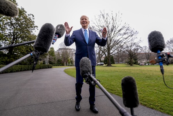 FILE - President Joe Biden speaks to members of the media before boarding Marine One on the South Lawn of the White House in Washington, Tuesday, Jan. 30, 2024. Occupants of the White House have grumbled over news coverage practically since the place was built. Now it's Biden's turn: With a re-election campaign underway, there are signs that those behind the president are starting to more aggressively and publicly challenge how he is portrayed. (AP Photo/Andrew Harnik, File)