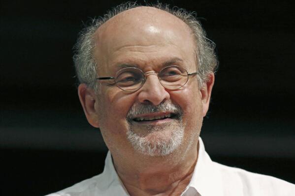 FILE - Author Salman Rushdie appears during the Mississippi Book Festival in Jackson, Miss., on Aug. 18, 2018. The U.S. is imposing financial penalties on an Iranian-based organization that raised money to target British-American author Rushdie, who was violently attacked at an August literary event. (AP Photo/Rogelio V. Solis, File)