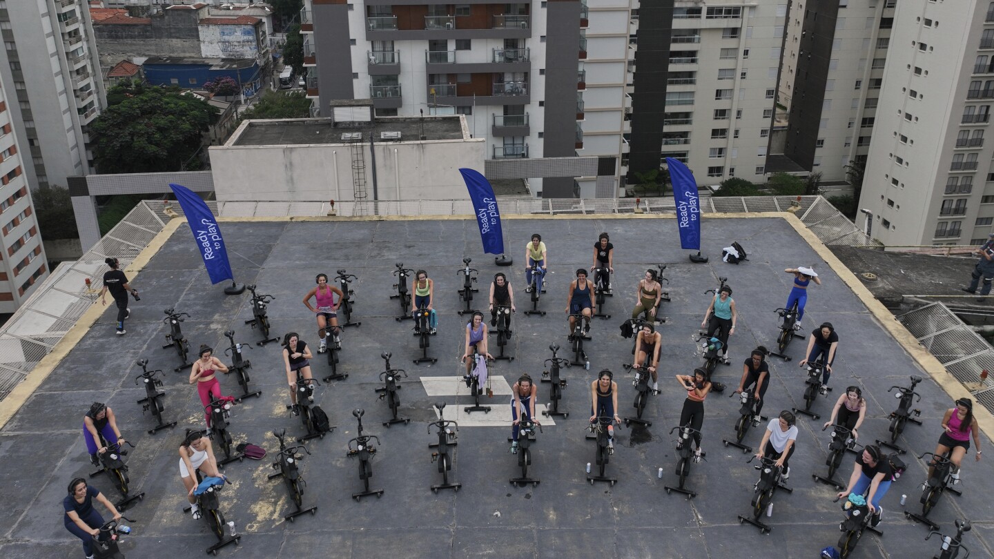 More Brazilians taking outdoor spin classes on helipads