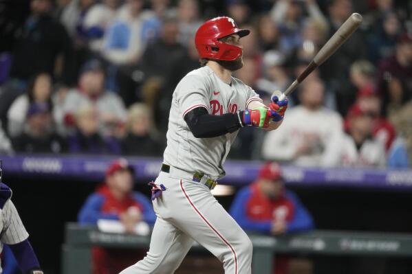 Harper tossed after charging Colorado's dugout