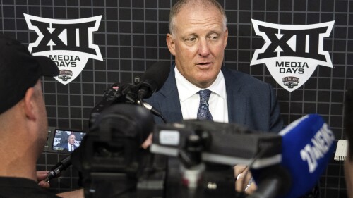 Kansas State head coach Chris Klieman answers questions at the NCAA college Big 12 Media Days in Arlington, Texas, Thursday, July 13, 2023. (Sara Diggins/Austin American-Statesman via AP)