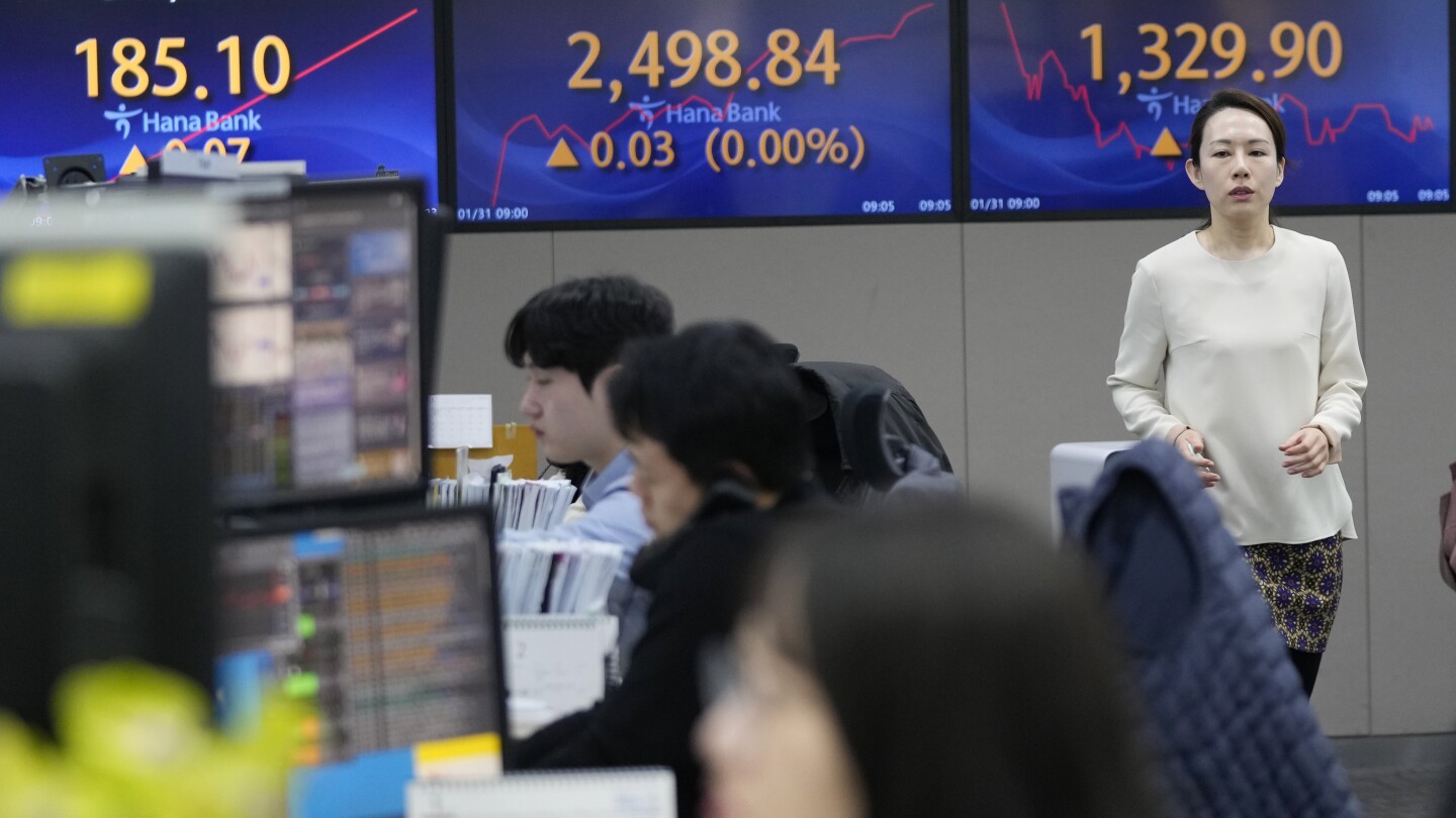 ХОНКОНГ AP — Азиатските акции бяха смесени в сряда тъй
