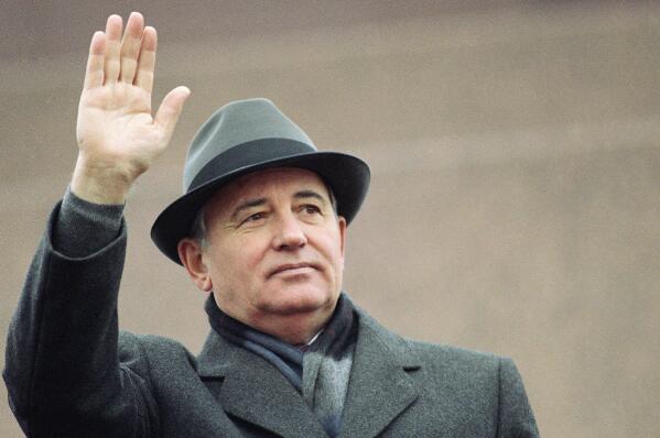 FILE - Soviet President Mikhail Gorbachev waves from the Red Square tribune during a Revolution Day celebration, in Moscow, Soviet Union, Tuesday, Nov. 7, 1989. Russian news agencies are reporting that former Soviet President Mikhail Gorbachev has died at 91. The Tass, RIA Novosti and Interfax news agencies cited the Central Clinical Hospital. (AP Photo/Boris Yurchenko, File)