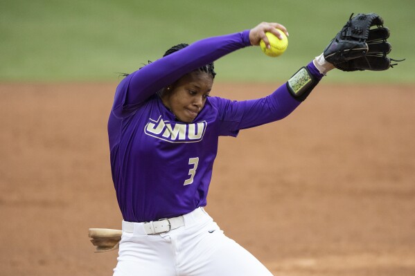 FILE - James Madison's Odicci Alexander (3) pitches during an NCAA softball game on Saturday, April 6, 2019, in Chapel Hill, N.C. Odicci Alexander’s Cinderella story just keeps getting better. Two years after she took the nation by storm and led upstart James Madison to the Women’s College World Series semifinals, she has won the Athletes Unlimited softball championship. (AP Photo/Ben McKeown, FIle)