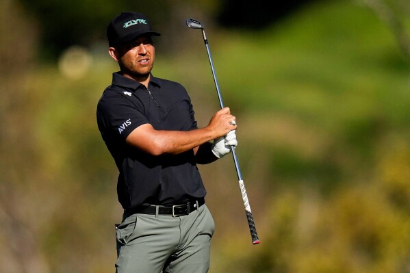 Xander Schauffele watches his shot from the fourth fairway during the first round The Sentry golf tournament, Thursday, Jan. 2, 2025, at Kapalua Plantation Course in Kapalua, Hawaii. (AP Photo/Matt York, File)