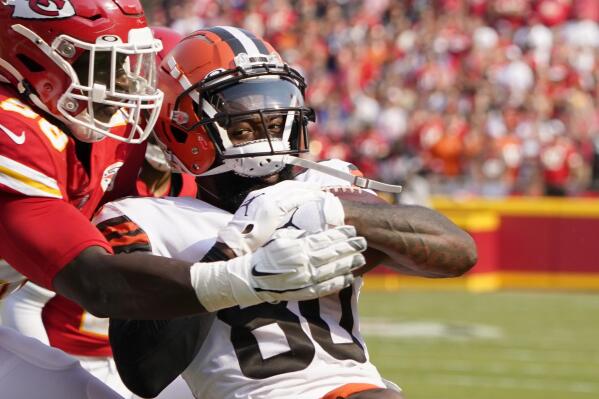Cleveland Browns wide receiver Jarvis Landry, right, scores past Kansas City Chiefs defensive tackle Tershawn Wharton during the first half of an NFL football game Sunday, Sept. 12, 2021, in Kansas City, Mo. (AP Photo/Ed Zurga)