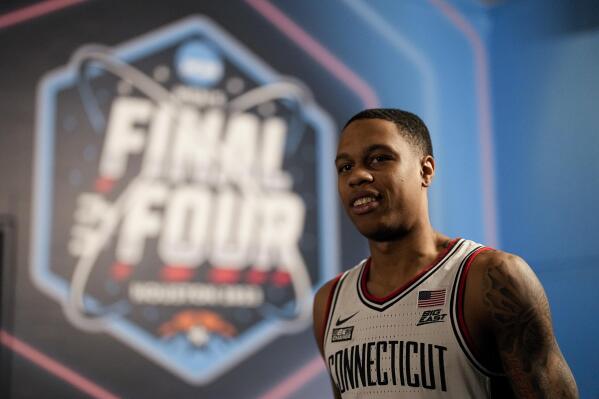 Connecticut guard Jordan Hawkins leaves after a news conference in preparation for the Final Four college basketball game in the NCAA Tournament on Thursday, March 30, 2023, in Houston. Miami will face UConn on Saturday. (AP Photo/David J. Phillip)