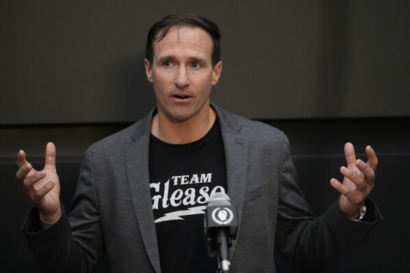 Former New Orleans Saints quarterback Drew Brees speaks to reporters at a news conference announcing him as the sole 2024 inductee into the New Orleans Saints Hall of Fame, Thursday, May 30, 2024, in Metairie, La. (AP Photo/Gerald Herbert)