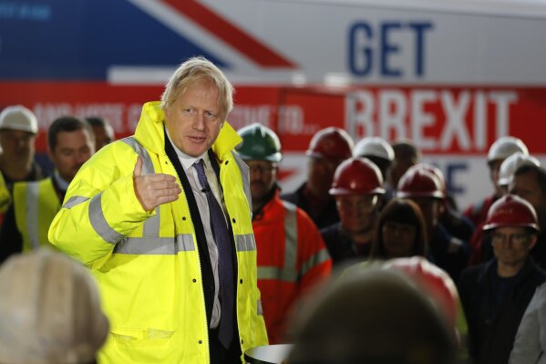 Britain's Prime Minister Boris Johnson speaks to workers during a visit to Wilton Engineering Services, part of a General Election campaign trail stop in Middlesbrough, England, Wednesday, Nov. 20, 2019. Britain goes to the polls on Dec. 12. (AP Photo/Frank Augstein, Pool)