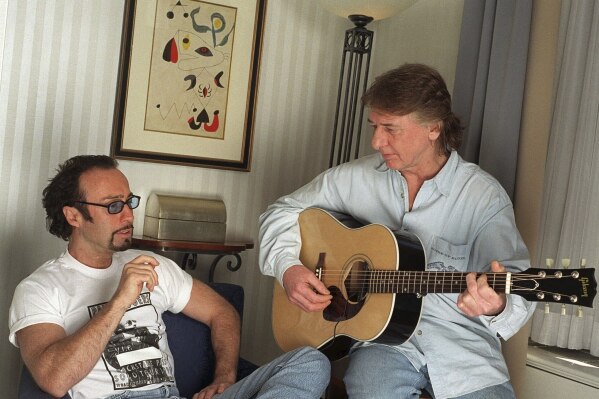 Paul Rodgers, left, and Mick Ralphs, members of the band Bad Company, pose in New York April 5, 1999. (AP Photo/Jim Cooper, File)