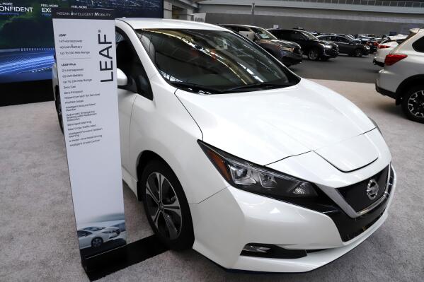 FILE - This is a 2020 Nissan Leaf on display at the 2020 Pittsburgh International Auto Show Thursday, Feb.13, 2020 in Pittsburgh. Nissan is speeding up its shift toward electric vehicles, especially in Europe where emissions regulations are most stringent, the company said Monday, Feb. 27, 2023.(AP Photo/Gene J. Puskar, File)
