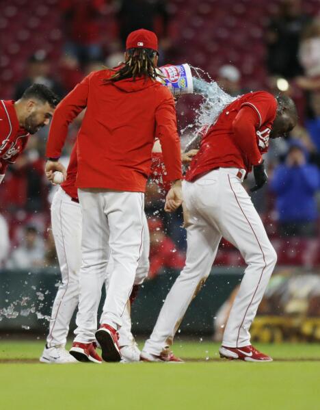 Reds beat Nationals 8-7 in 11 but fall further behind Cards