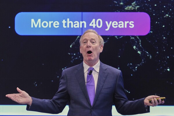Microsoft's President Brad Smith speaks at a conference on digital resilience during geopolitical volatility in Brussels, Wednesday, April 30, 2025. (AP Photo/Virginia Mayo)