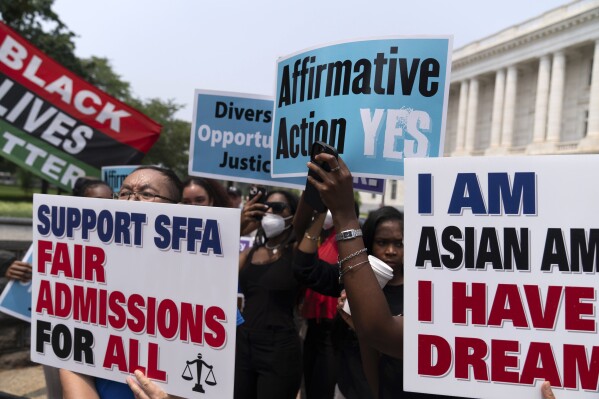 FILE - Demonstrators protest outside of the Supreme Court in Washington, Thursday, June 29, 2023, after the Supreme Court struck down affirmative action in college admissions, saying race cannot be a factor. Days after the Supreme Court outlawed affirmative action in college admissions, activists say they will sue Harvard over its use of legacy preferences for children of alumni. (AP Photo/Jose Luis Magana, File)