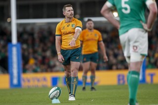 FILE - Australia's Bernard Foley prepares to take a penalty shot at goal during the rugby union international between Ireland and Australia at the Aviva Stadium in Dublin, Ireland, Saturday, Nov. 19, 2022. All Blacks hooker Dane Coles, Wallabies flyhalf Bernard Foley and Wales fullback Liam Williams all are now playing for Kubota Spears Funabashi Tokyo Bay in Japan League One. (AP Photo/Peter Morrison, File)