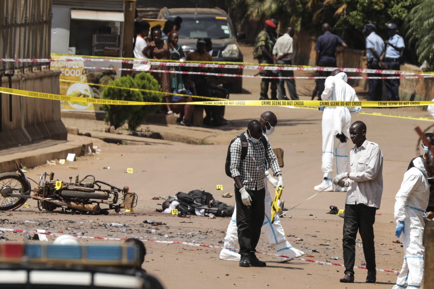 2 people die before a suspected explosive attack in Uganda's capital, authorities say