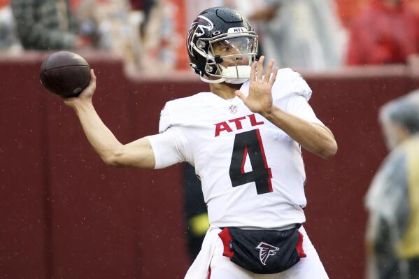 FILE - Atlanta Falcons quarterback Desmond Ridder (4) throws before an NFL football game against the Washington Commanders on Nov. 27, 2022, in Landover, Md. The Atlanta Falcons will have more on the line than retaining hope in the weak NFC South race as rookie quarterback Ridder makes his debut as the starter on Sunday, Dec. 18, at New Orleans. (AP Photo/Daniel Kucin Jr., File)