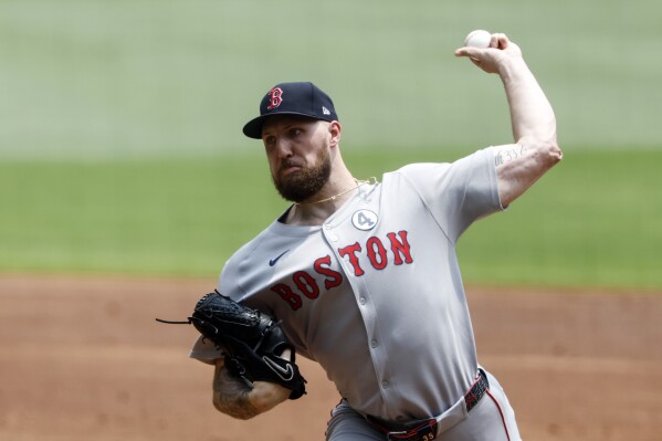 Boston Red Sox pitcher Garrett Crochet throws during the first inning of a baseball game against the Atlanta Braves, Sunday, June 1, 2025, in Atlanta. (AP Photo/Butch Dill)