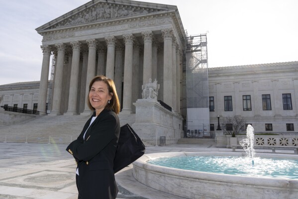 Attorney Lisa Blatt, of Williams & Connolly LLP, poses for a photograph in front of the Supreme Court, Monday, April 8, 2024, in Washington. Blatt will argue her 50th case before the Supreme Court later this month. She will have argued more cases before the Supreme Court than any other woman. (AP Photo/Alex Brandon)