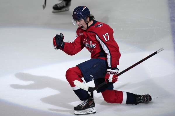 Washington Capitals center Dylan Strome celebrates after his overtime goal against the Buffalo Sabres in an NHL hockey game Wednesday, Nov. 22, 2023, in Washington. (AP Photo/Mark Schiefelbein)