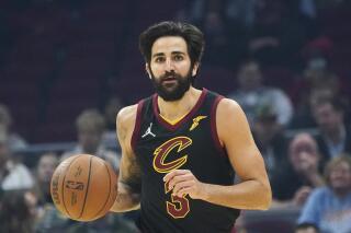 FILE - Cleveland Cavaliers' Ricky Rubio drives against the Atlanta Hawks in the first half of an NBA basketball game, Saturday, Oct. 23, 2021, in Cleveland. Free agent point guard Ricky Rubio has an agreed to return to the Cleveland Cavaliers on a multi-year contract, a person familiar with the negotiations told the Associated Press on Friday, July 1, 2022. (AP Photo/Tony Dejak, File)