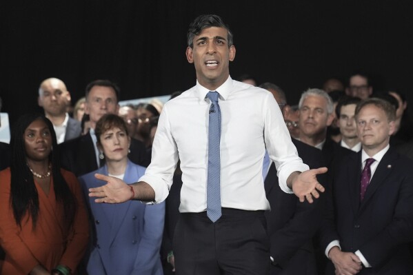 Britain's Prime Minister Rishi Sunak gestures during a General Election campaign event at ExCeL London, in east London, Wednesday May 22, 2024, after setting the date of July 4 for a national election in the UK. (Stefan Rousseau/PA via AP)