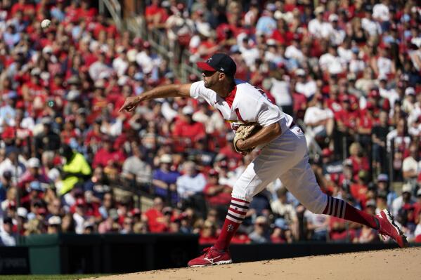 St. Louis Cardinals starting pitcher Adam Wainwright throws during the second inning of a baseball game against the Pittsburgh Pirates Sunday, Oct. 2, 2022, in St. Louis. (AP Photo/Jeff Roberson)