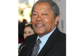 FILE - In this Aug. 12, 2013 file photo, Clarence Williams III arrives at the Los Angeles premiere of "Lee Daniels' The Butler" at the Regal Cinemas L.A. Live Stadium. Williams died Friday at his home in Los Angeles after a battle with colon cancer, his manager Allan Mindel said Sunday, June 6, 2021. He was 81. (Photo by Matt Sayles/Invision/AP, File)