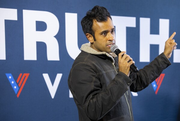 Republican presidential candidate Vivek Ramaswamy speaks to a crowd about what he would accomplish if he were elected president during a "Commit to Caucus" rally at Lion Bridge Brewing in Cedar Rapids, Iowa, Monday, Jan. 15, 2024. (Savannah Blake/The Gazette via AP)