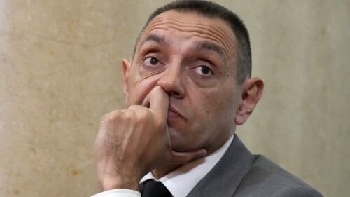 FILE - Serbian spy chief Aleksandar Vulin listens during a press conference of Serbian President Aleksandar Vucic, in Belgrade, Serbia, Saturday, Oct. 8, 2022. Serbia’s President Aleksandar Vucic says the real reason why the country’s intelligence agency chief is facing U.S. sanctions is his position toward Russia and not corruption allegations. (AP Photo/Darko Vojinovic, File)