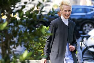 FILE - E. Jean Carroll poses for a photo, Sunday, June 23, 2019, in New York. Sexual assault victims in New York will get a one-time opportunity to sue their abusers starting Thursday under a new law expected to bring a wave of litigation against prison guards, middle managers, doctors and a few prominent figures including former President Donald Trump. (AP Photo/Craig Ruttle, File)