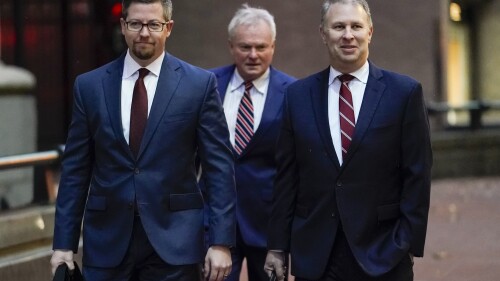 FILE - Former Ohio Republican Party Chairman Matt Borges, right, walks toward Potter Stewart U.S. Courthouse with his attorneys Todd Long, left, and Karl Schneider, center, before jury selection in his federal trial, Jan. 20, 2023, in Cincinnati, Ohio. Borges has been sentenced, Friday, June 30, 2023, to five years in prison and three years of probation for his part in the largest corruption scandal in Ohio history. AP Photo/Joshua A. Bickel, File)