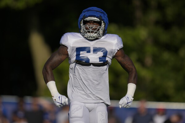Indianapolis Colts linebacker Shaquille Leonard (53) celebrates a stop against the Chicago Bears during an NFL football joint practice at the Colts' training camp in Westfield, Ind., Wednesday, Aug. 16, 2023. (AP Photo/Michael Conroy)