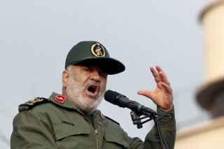 FILE - In this Monday, Nov. 25, 2019 file photo, Chief of Iran's Revolutionary Guard Gen. Hossein Salami speaks at a pro-government rally, in Tehran, Iran. The chief of Iran’s paramilitary Revolutionary Guard has threatened to go after everyone who had a role in a top general’s January killing during a U.S. drone strike in Iraq. The guard’s website on Saturday, Sept. 19, 2020 quoted Gen. Hossein Salami as saying, “Mr. Trump! Our revenge for martyrdom of our great general is obvious, serious and real.” U.S. President Donald Trump warned this week that Washington would harshly respond to any Iranian attempts to take revenge for the death of Gen. Qassem Soleimani.  (AP Photo/Ebrahim Noroozi, File)