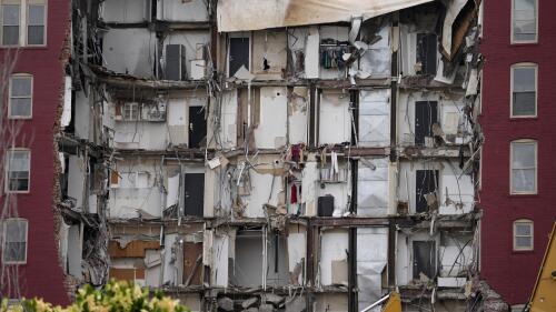 Seen is the damage from a collapsed apartment building, Monday, June 5, 2023, in Davenport, Iowa. The six-story, 80-unit building partially collapsed May 28. (AP Photo/Charlie Neibergall)